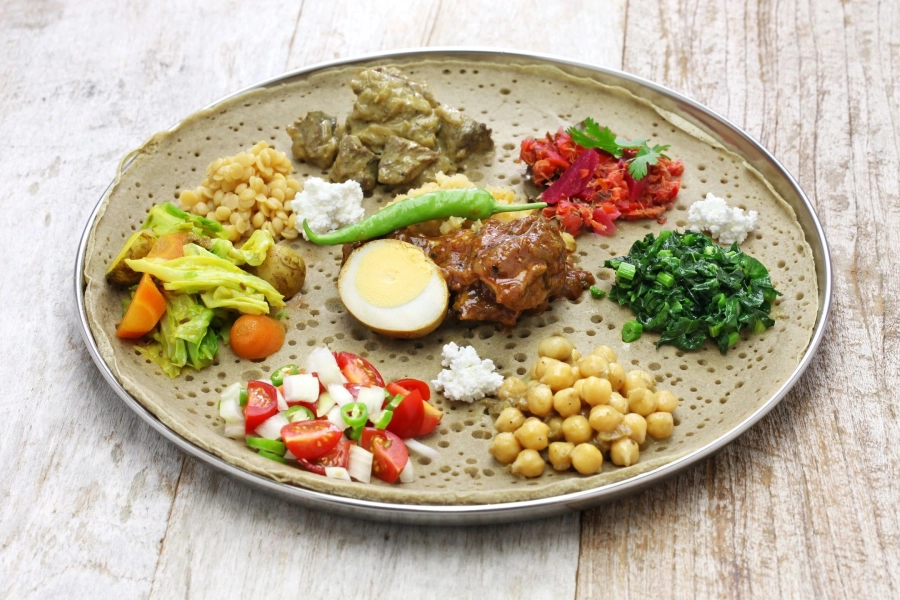 A plate of food with many different foods on it.