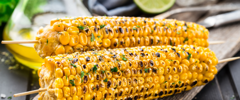 A close up of corn on the cob with lime