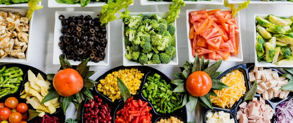 A table filled with different types of vegetables.