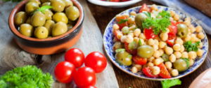 A table with bowls of food on it