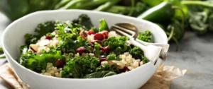 A bowl of food with broccoli and rice.