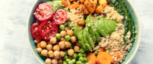 A close up of some vegetables and rice