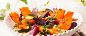 A close up of a plate of food with vegetables